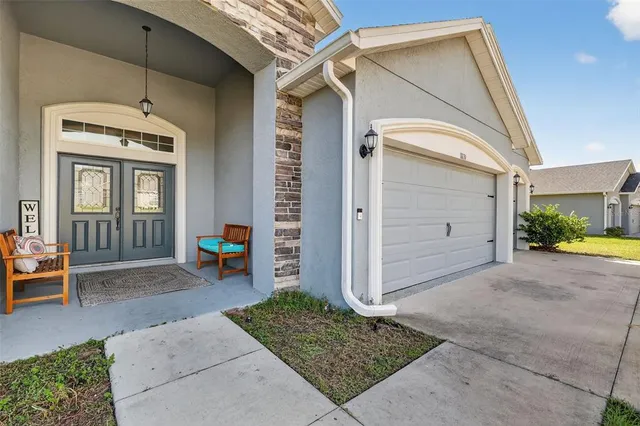 a view of a porch with seating space