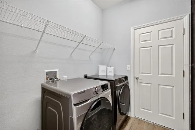 a utility room with dryer and washer