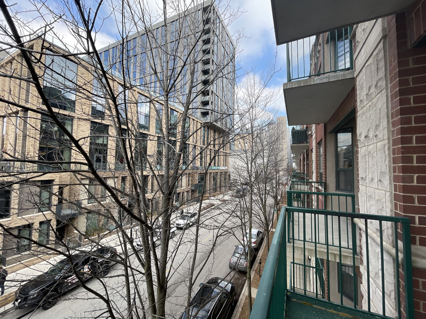 849 West Monroe Street, Unit 3F Chicago, IL 60607 - Photo 17 of 18 a view of a brick house with a large tree