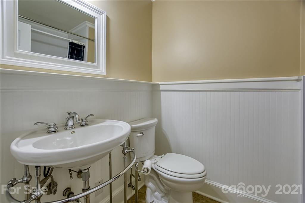 5401 Valley Forge Road Charlotte, NC 28210 - Photo 13 of 27 a bathroom with a sink and a toilet