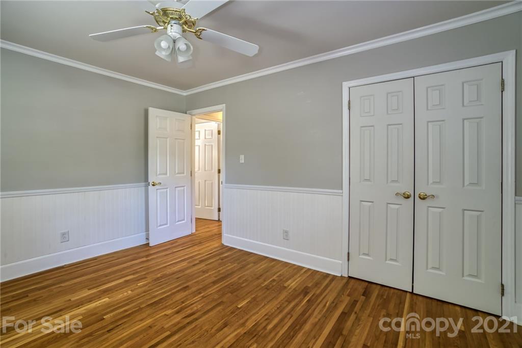 5401 Valley Forge Road Charlotte, NC 28210 - Photo 17 of 27 a view of an empty room with wooden floor