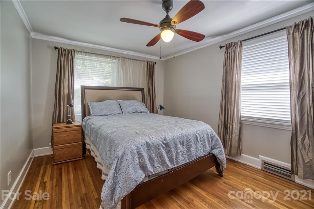 5401 Valley Forge Road Charlotte, NC 28210 - Photo 18 of 27 a bedroom with a bed and window