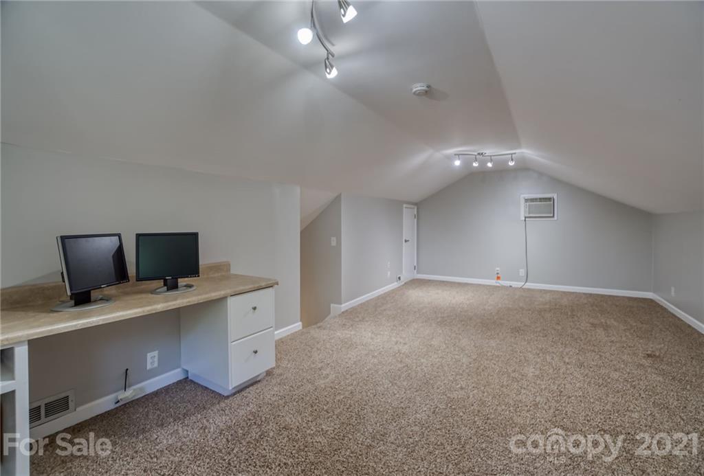 5401 Valley Forge Road Charlotte, NC 28210 - Photo 23 of 27 a workspace with a table and chairs