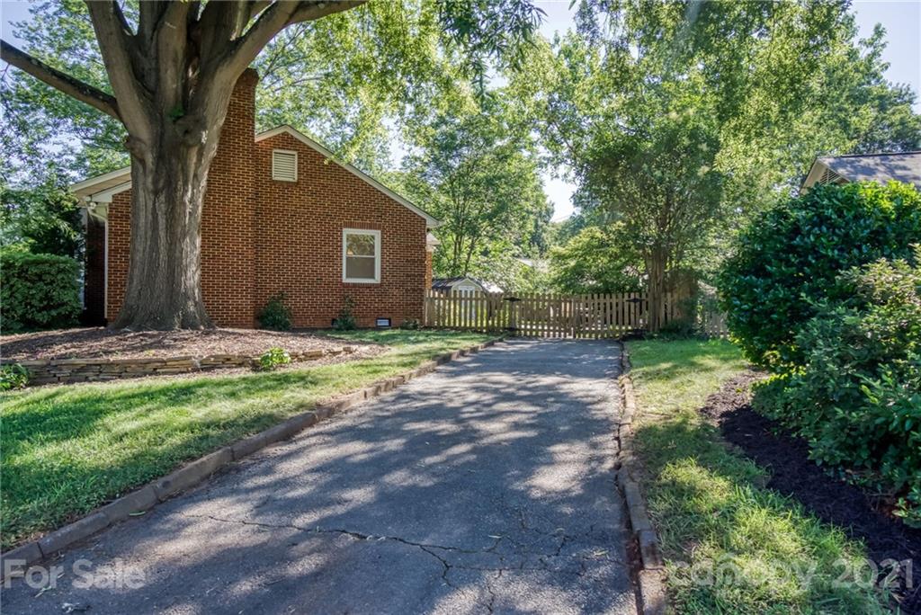 5401 Valley Forge Road Charlotte, NC 28210 - Photo 27 of 27 a backyard of a house with lots of green space