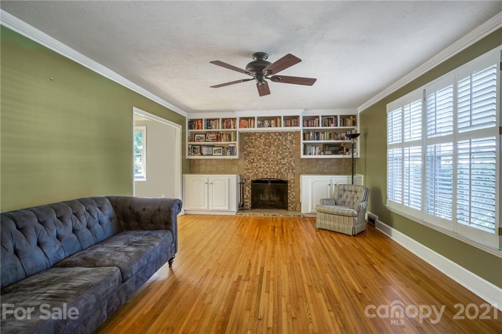 5401 Valley Forge Road Charlotte, NC 28210 - Photo 4 of 27 a living room with furniture and a fireplace
