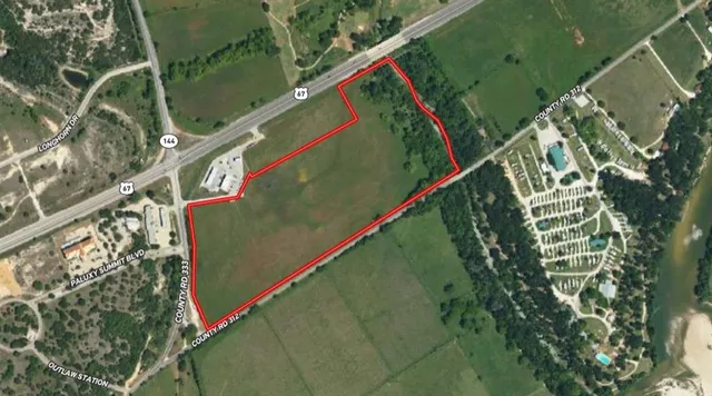 a view of swimming pool with a balcony