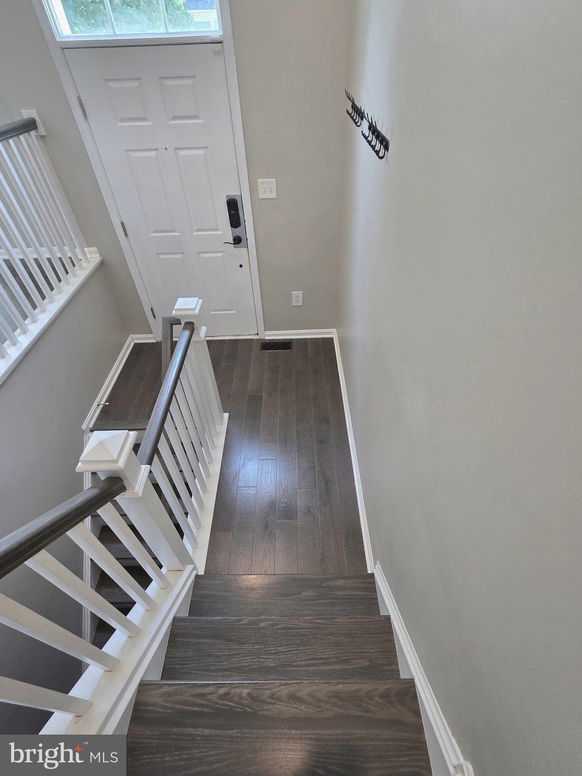 11847 Skylark Road Clarksburg, MD 20871 - Photo 36 of 46 a view of entryway and hall with wooden floor