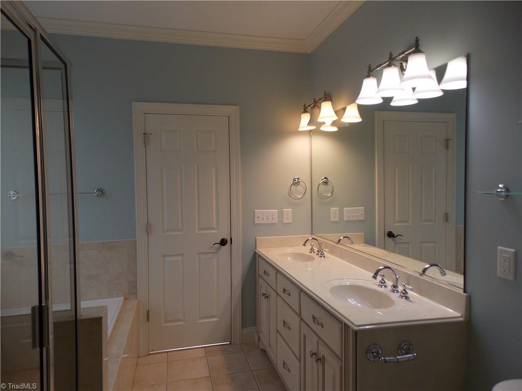 7802 Perthshire Drive Oak Ridge, NC 27310 - Photo 14 of 30 Master en suite with double sinks