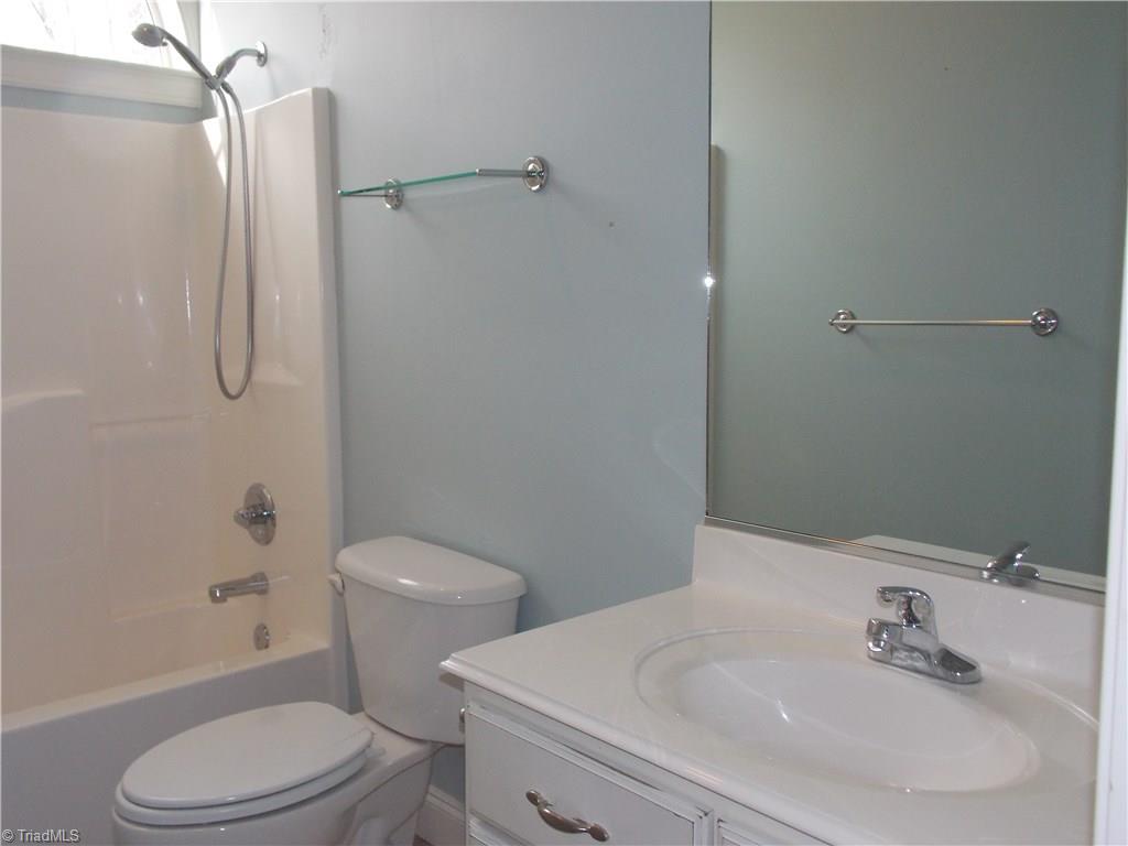 7802 Perthshire Drive Oak Ridge, NC 27310 - Photo 21 of 30 Bathroom located between 2nd and 3rd bedrooms