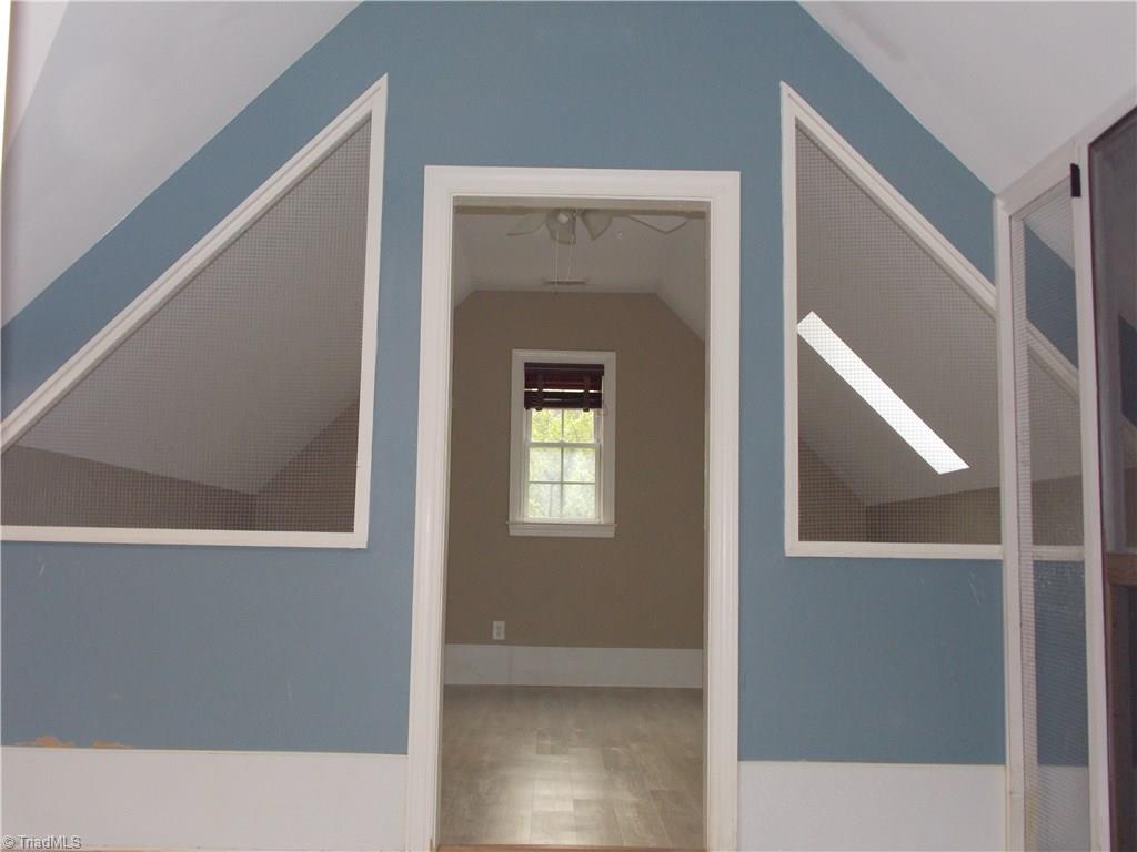 7802 Perthshire Drive Oak Ridge, NC 27310 - Photo 22 of 30 Bonus room with skylights