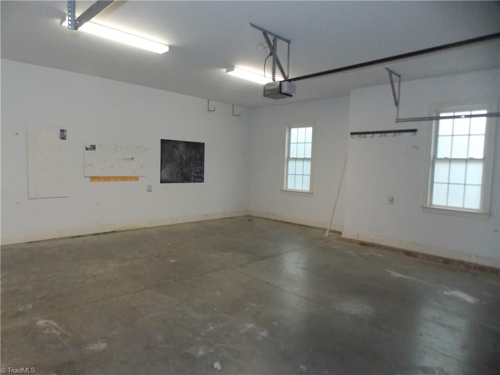 7802 Perthshire Drive Oak Ridge, NC 27310 - Photo 25 of 30 spacious 2 car garage with door openers