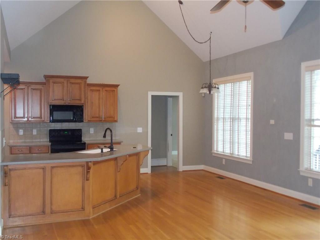 7802 Perthshire Drive Oak Ridge, NC 27310 - Photo 8 of 30 Kitchen and breakfast area