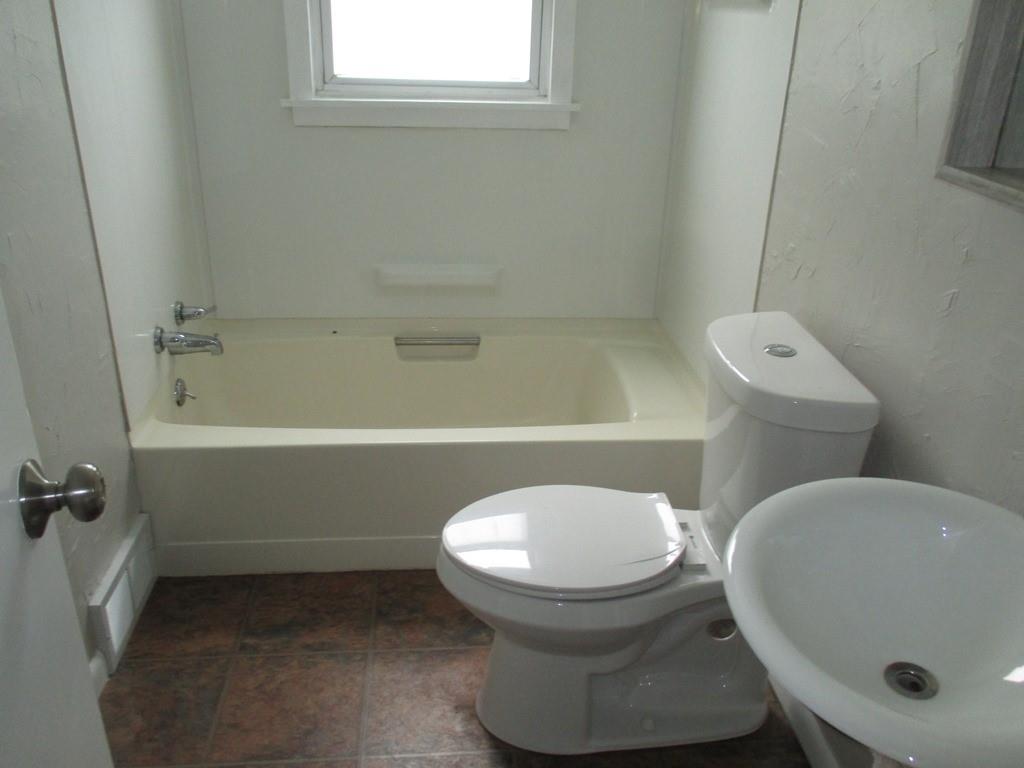 14 Krepps Road Ambridge, PA 15003 - Photo 15 of 22 a bathroom with a toilet and a bathtub
