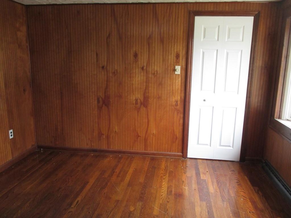 14 Krepps Road Ambridge, PA 15003 - Photo 4 of 22 a view of an empty room with wooden door
