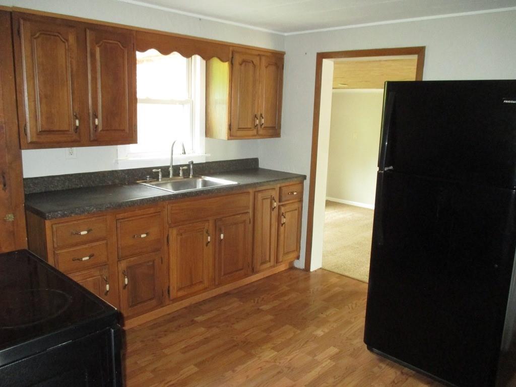 14 Krepps Road Ambridge, PA 15003 - Photo 8 of 22 a kitchen with a sink a window and cabinets