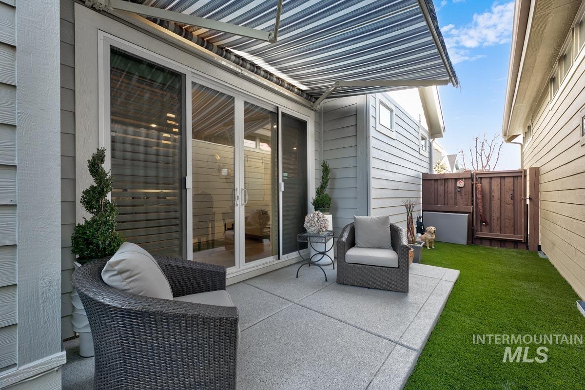 410 West Lockhart Lane Meridian, ID 83646 - Photo 18 of 41 View of patio with a gate