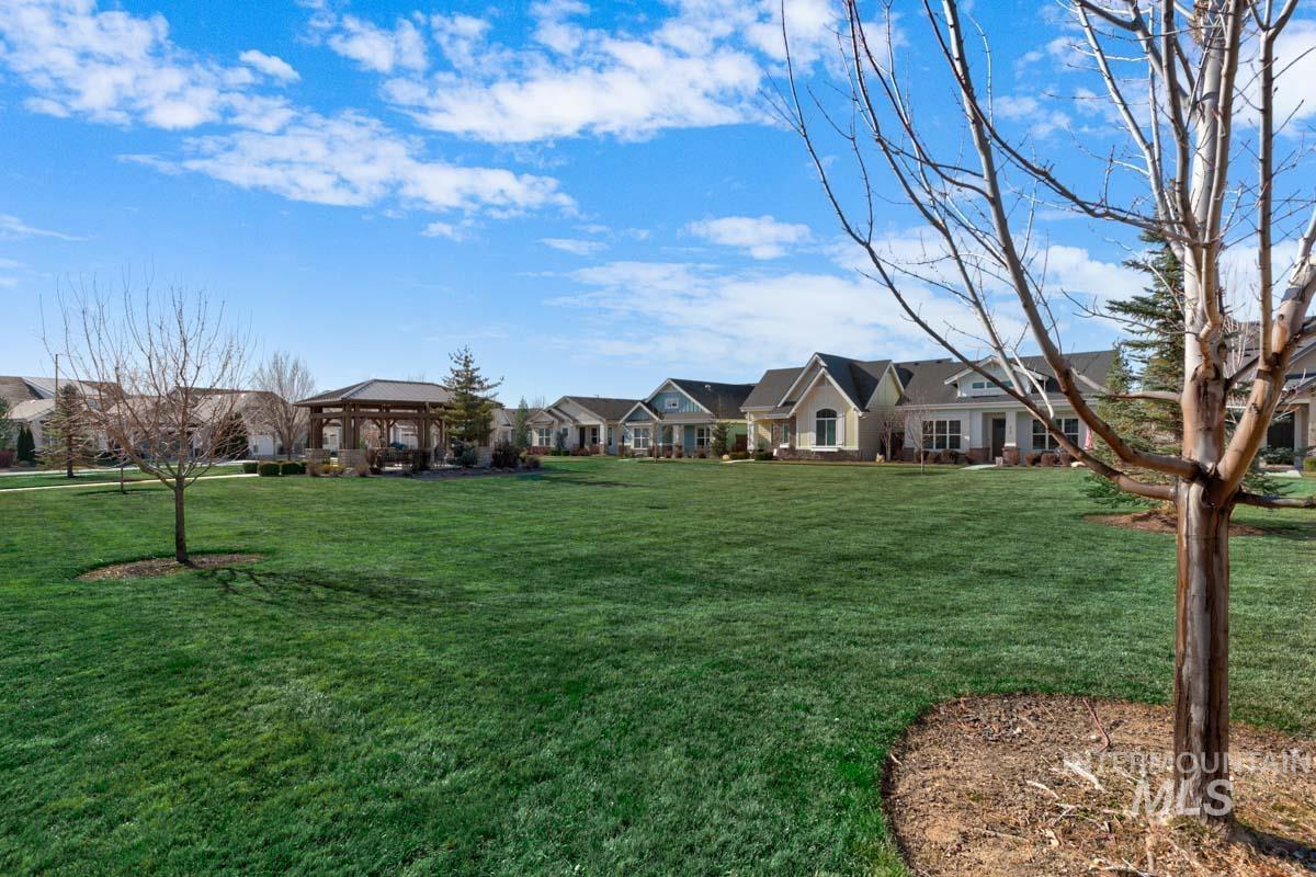 410 West Lockhart Lane Meridian, ID 83646 - Photo 29 of 41 View of green lawn with a gazebo and a residential view