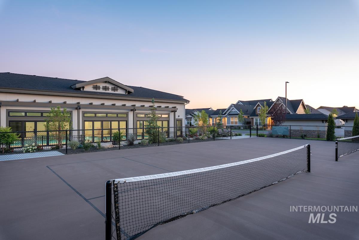 410 West Lockhart Lane Meridian, ID 83646 - Photo 34 of 41 View of home's community featuring a tennis court and a residential view
