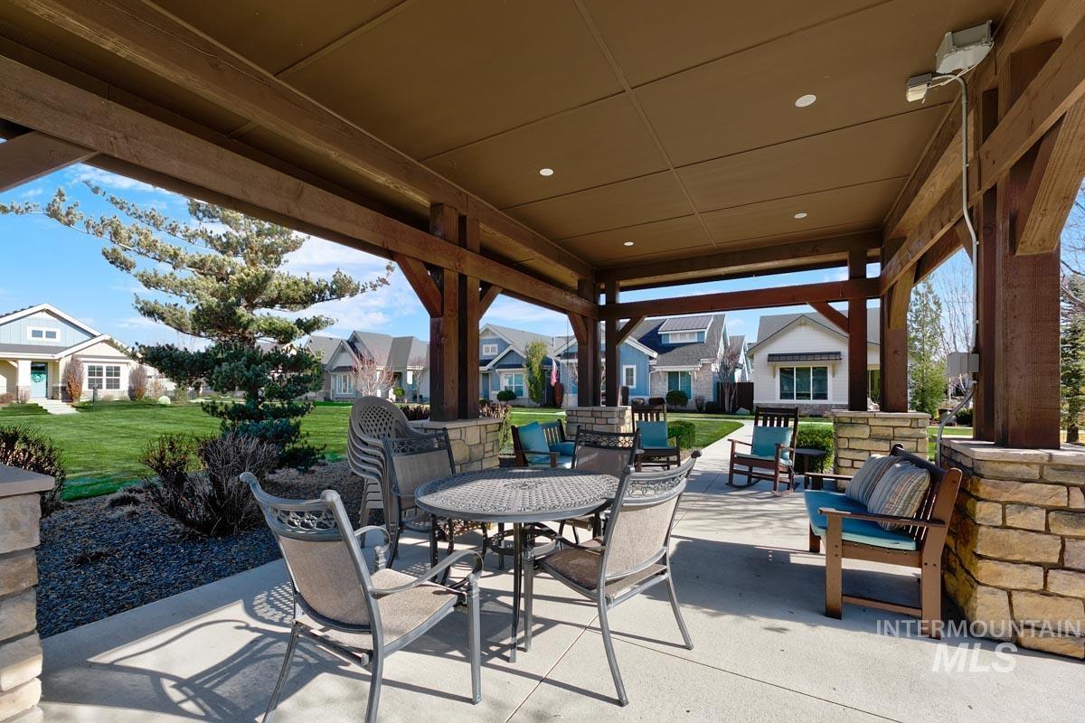 410 West Lockhart Lane Meridian, ID 83646 - Photo 38 of 41 View of patio featuring a residential view and outdoor dining space