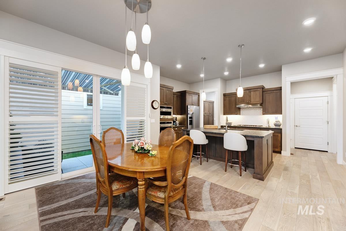 410 West Lockhart Lane Meridian, ID 83646 - Photo 10 of 41 Dining space with light wood-type flooring and recessed lighting
