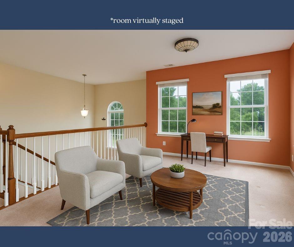 878 Treasure Court Fort Mill, SC 29708 - Photo 19 of 48 a living room with furniture and a window