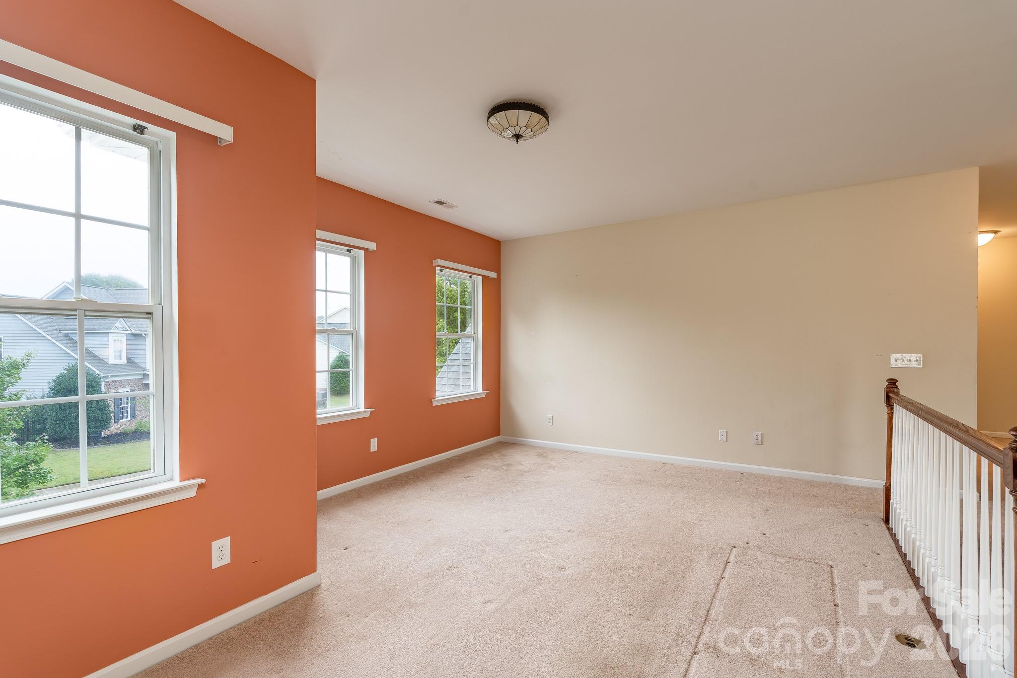 878 Treasure Court Fort Mill, SC 29708 - Photo 20 of 48 a view of an empty room with a window