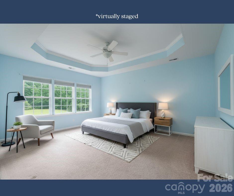 878 Treasure Court Fort Mill, SC 29708 - Photo 28 of 48 a living room with furniture and a large window