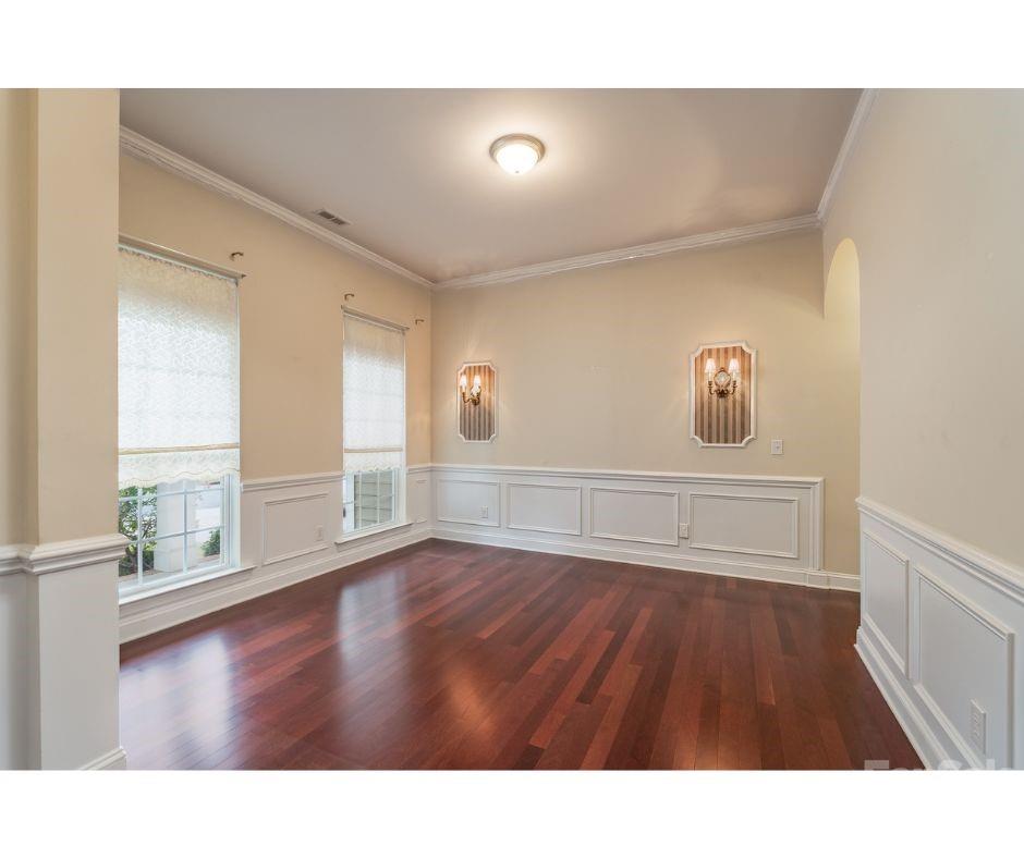 878 Treasure Court Fort Mill, SC 29708 - Photo 7 of 48 a open hall with wooden floor and windows