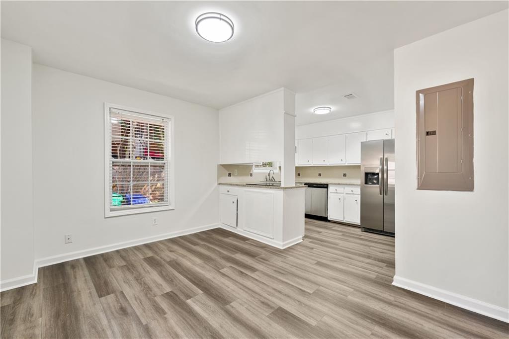 819 Gardenia Lane Decatur, GA 30033 - Photo 20 of 41 a view of kitchen with wooden floor