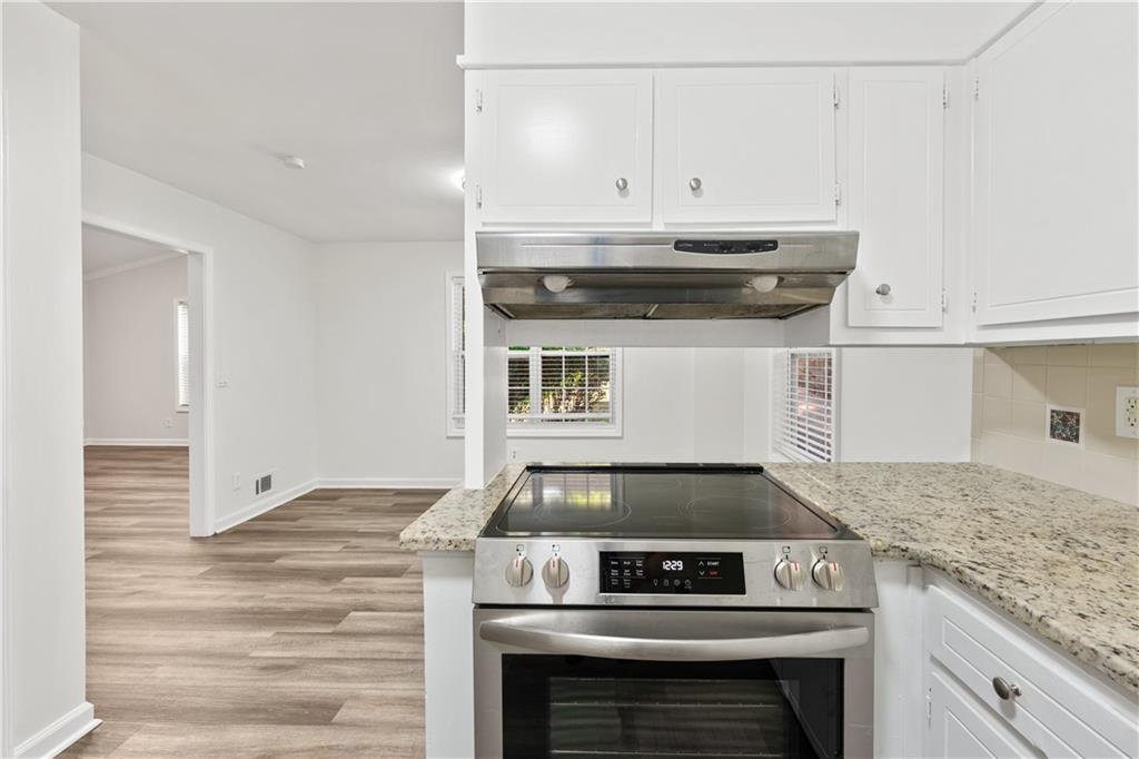 819 Gardenia Lane Decatur, GA 30033 - Photo 24 of 41 a stove top oven sitting inside of a kitchen