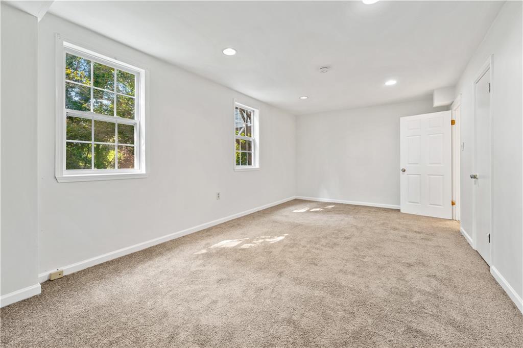819 Gardenia Lane Decatur, GA 30033 - Photo 33 of 41 an empty room with windows