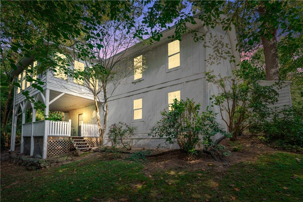 819 Gardenia Lane Decatur, GA 30033 - Photo 38 of 41 a view of a house with a tree and a yard