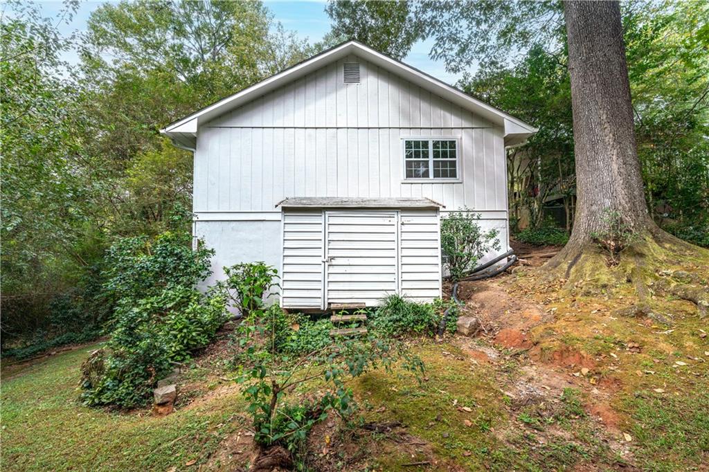 819 Gardenia Lane Decatur, GA 30033 - Photo 7 of 41 a view of a house with a yard