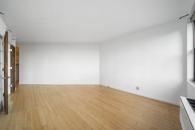 a view of a room with racks on the wall