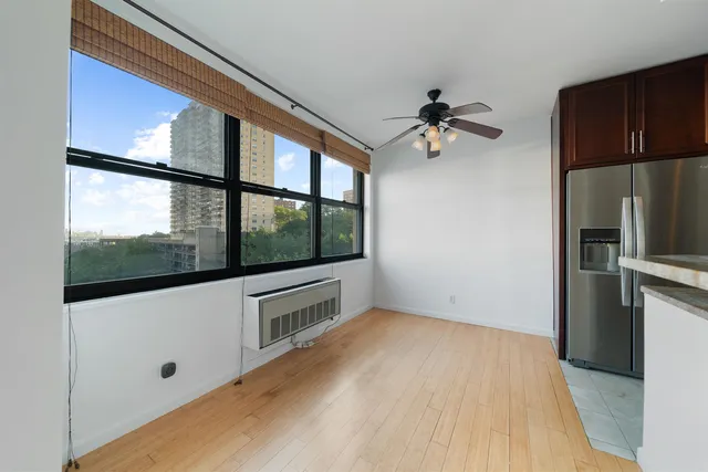 a kitchen with a sink cabinets and stainless steel appliances