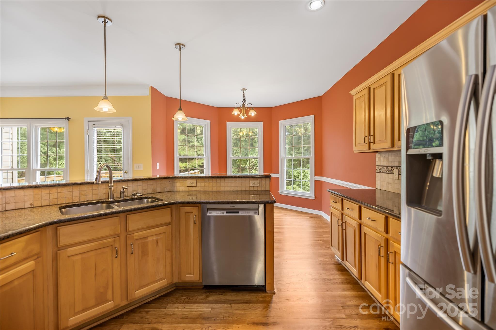 17112 Cambridge Grove Drive Huntersville, NC 28078 - Photo 13 of 44 a view of a kitchen with a large window
