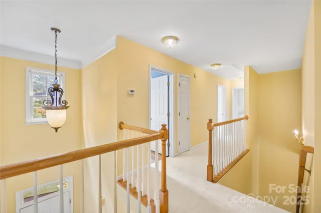 a view of a hallway with windows