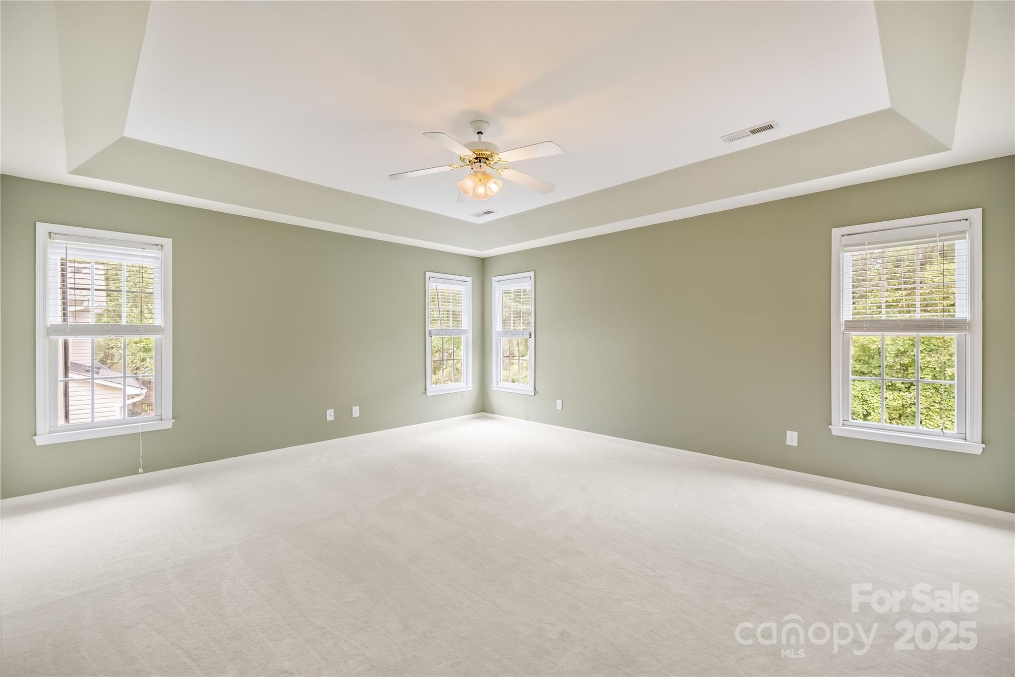 17112 Cambridge Grove Drive Huntersville, NC 28078 - Photo 18 of 44 a view of an empty room with a window