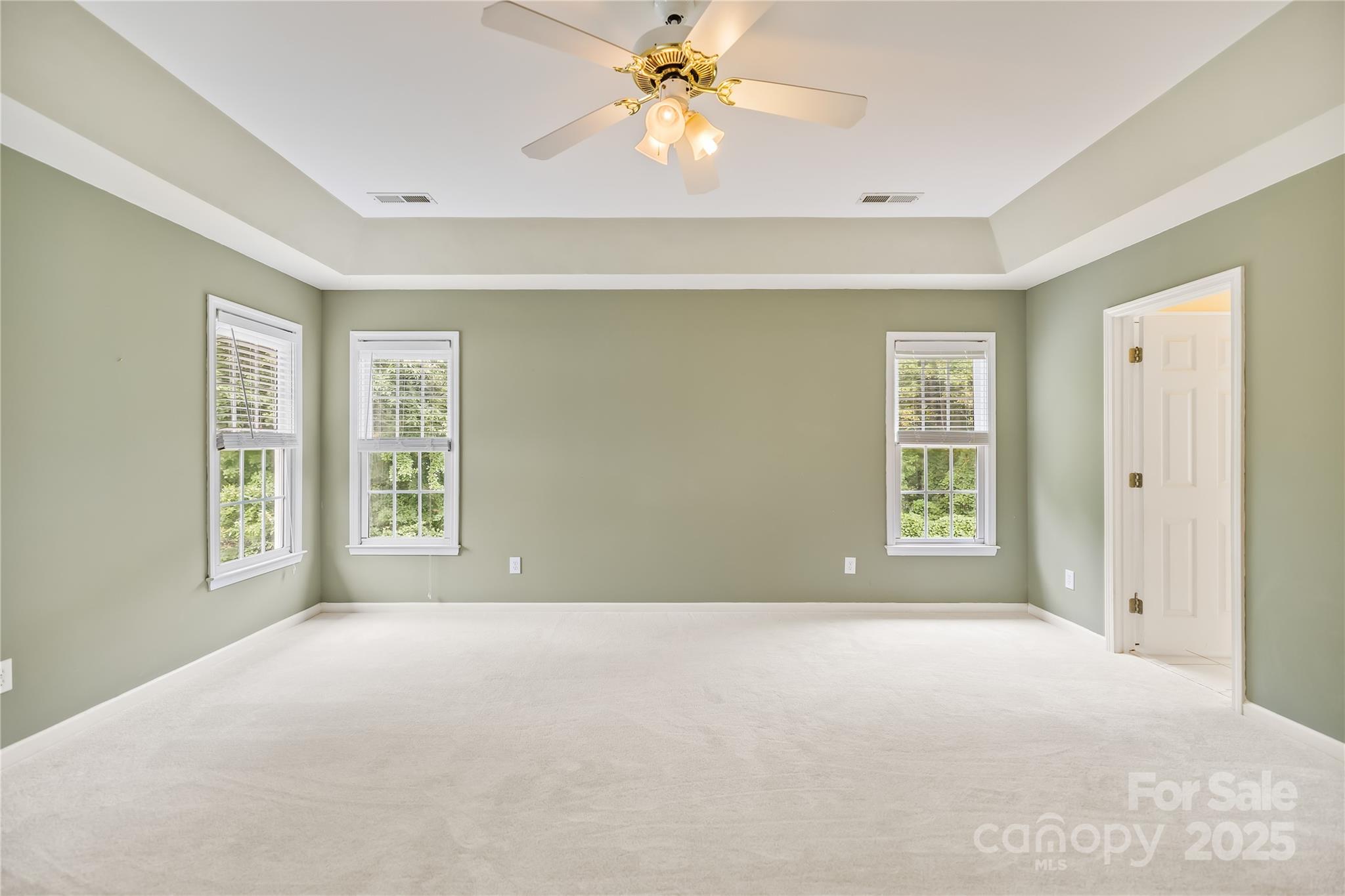 17112 Cambridge Grove Drive Huntersville, NC 28078 - Photo 19 of 44 a view of an empty room with a window