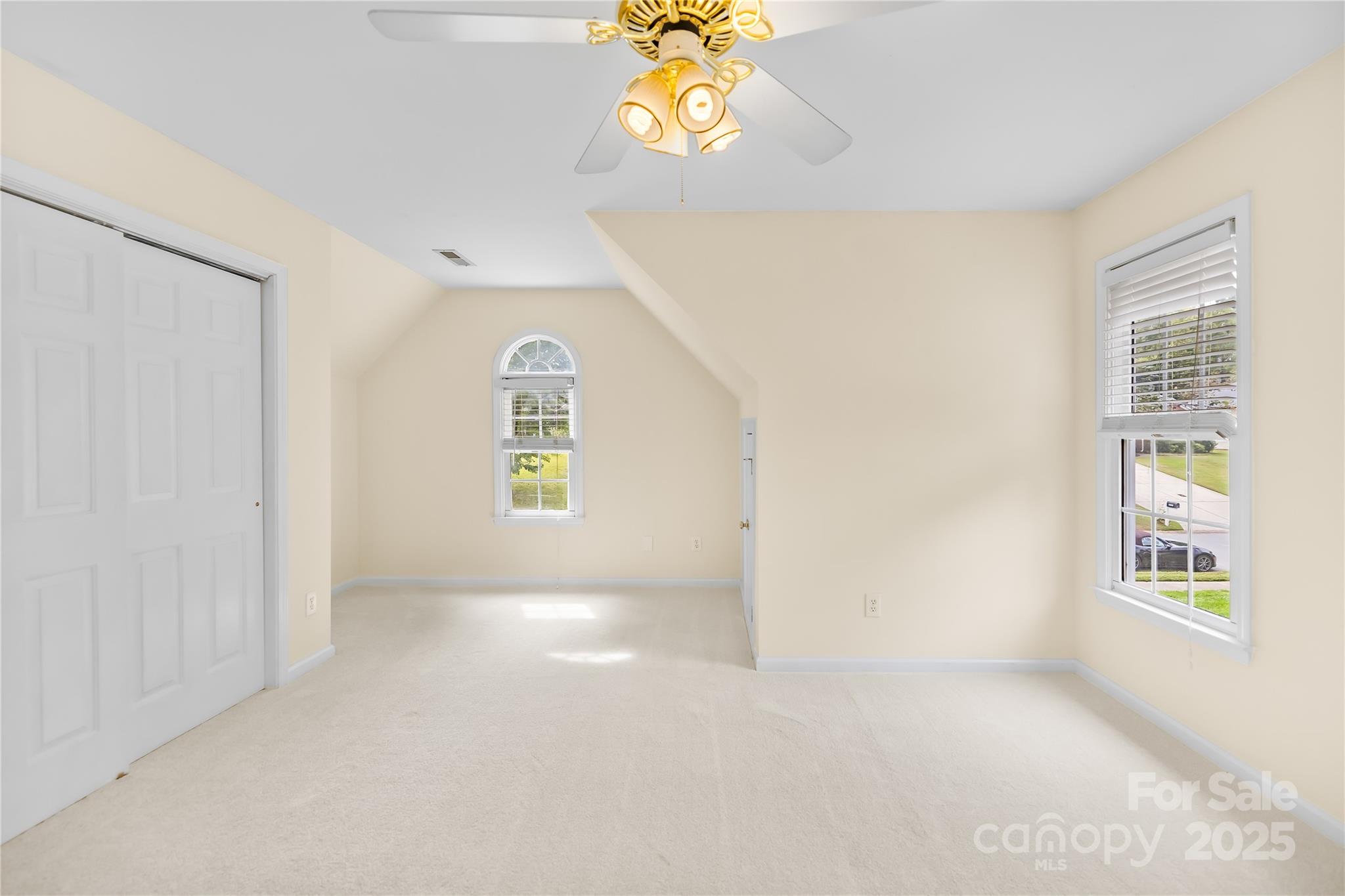 17112 Cambridge Grove Drive Huntersville, NC 28078 - Photo 23 of 44 a view of an empty room with a window