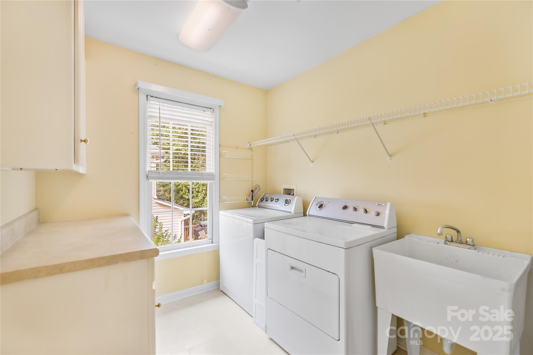 17112 Cambridge Grove Drive Huntersville, NC 28078 - Photo 28 of 44 a utility room with dryer and washer