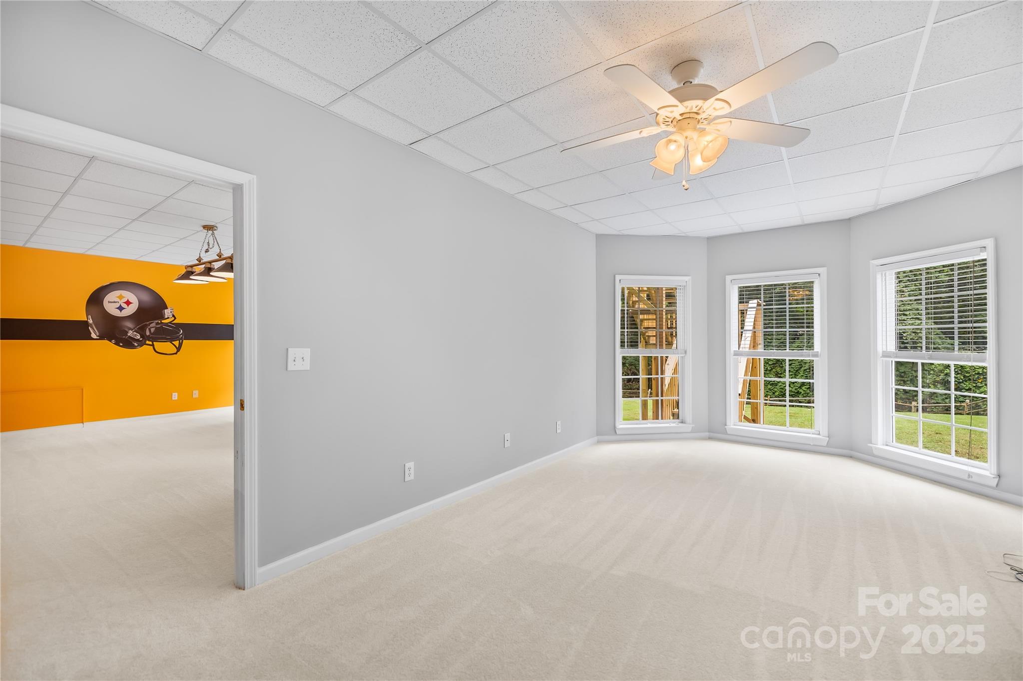 17112 Cambridge Grove Drive Huntersville, NC 28078 - Photo 31 of 44 en view of an empty room with a window