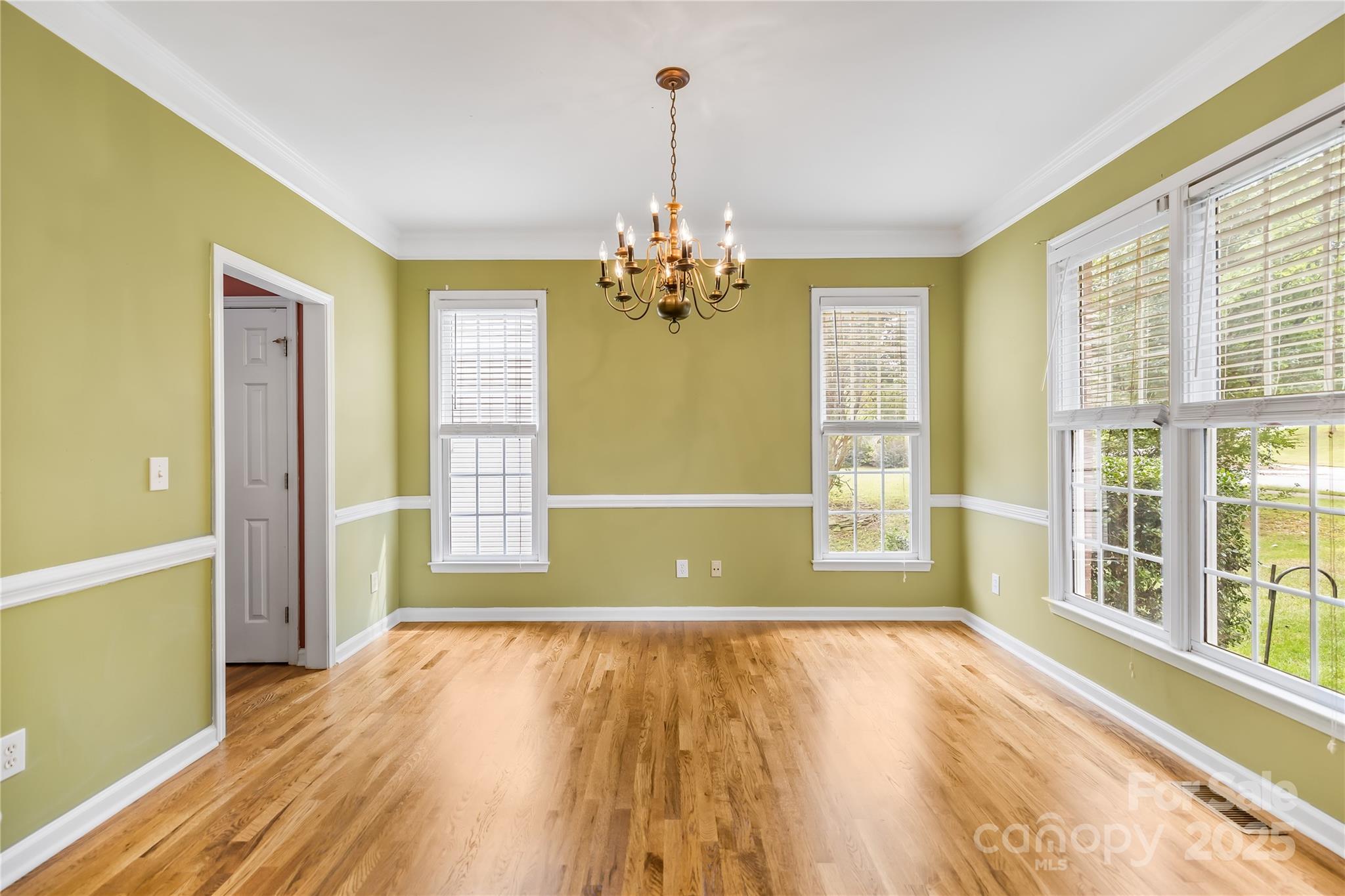 17112 Cambridge Grove Drive Huntersville, NC 28078 - Photo 5 of 44 a view of a room with wooden floor and entryway
