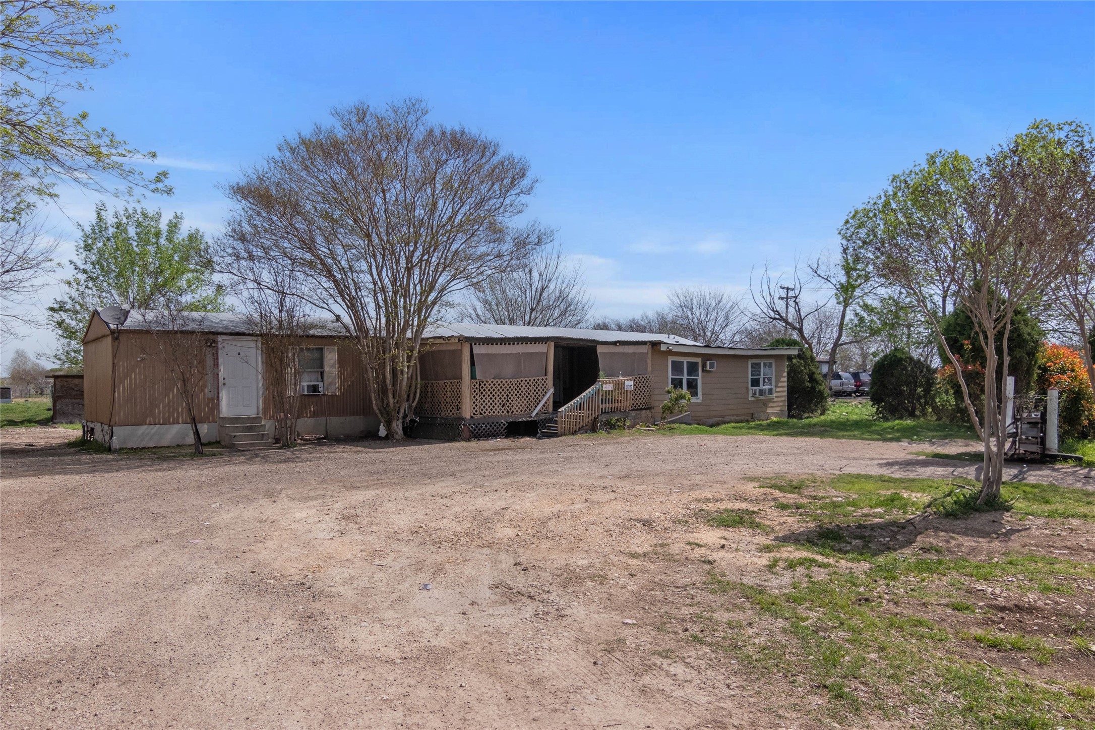 1185 Mathias Lane Kyle, TX 78640 - Photo 1 of 1 Rear view of house featuring entry steps