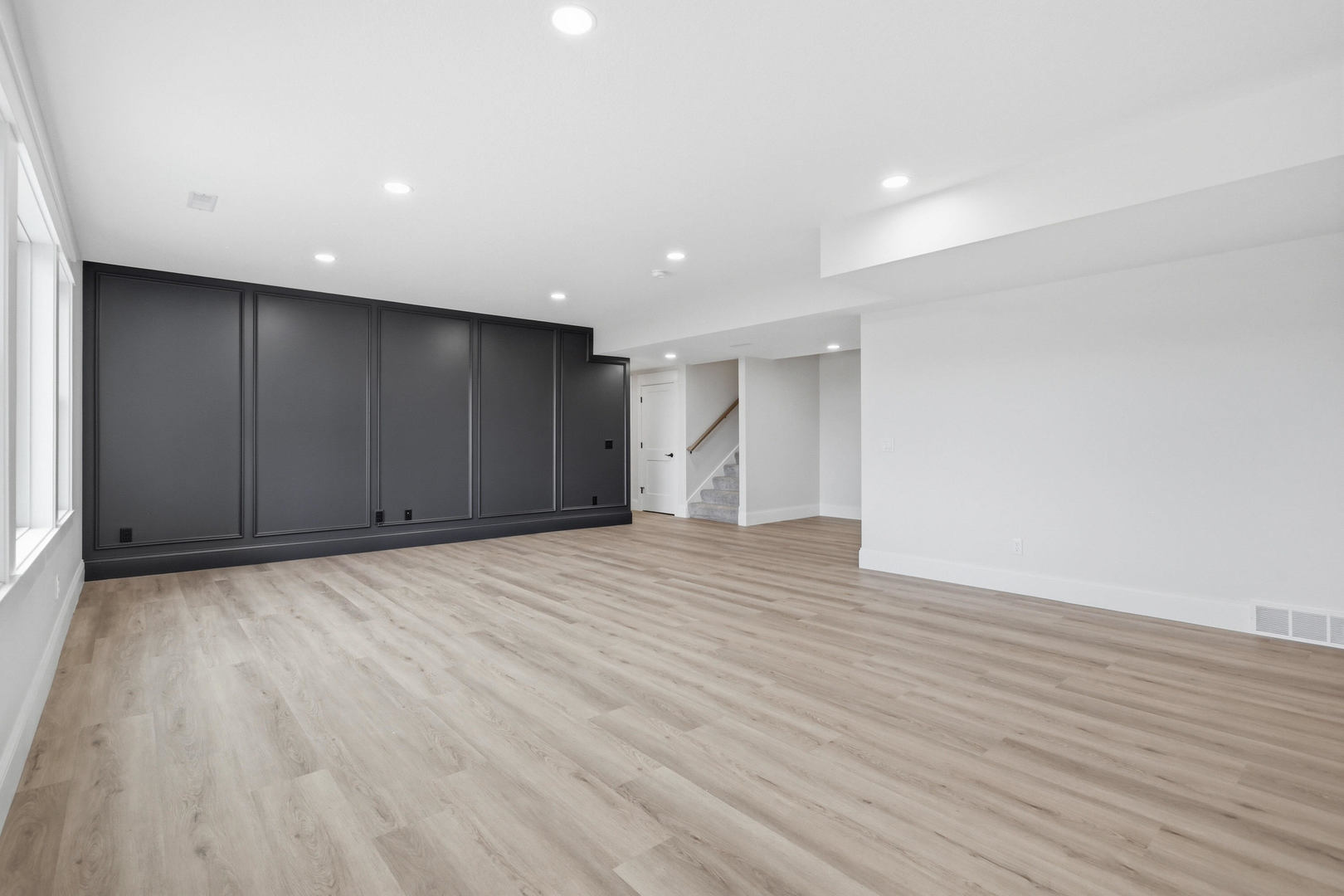 6928 Wilderness Pointe Bettendorf, IA 52722 - Photo 45 of 48 a view of an empty room with wooden floor
