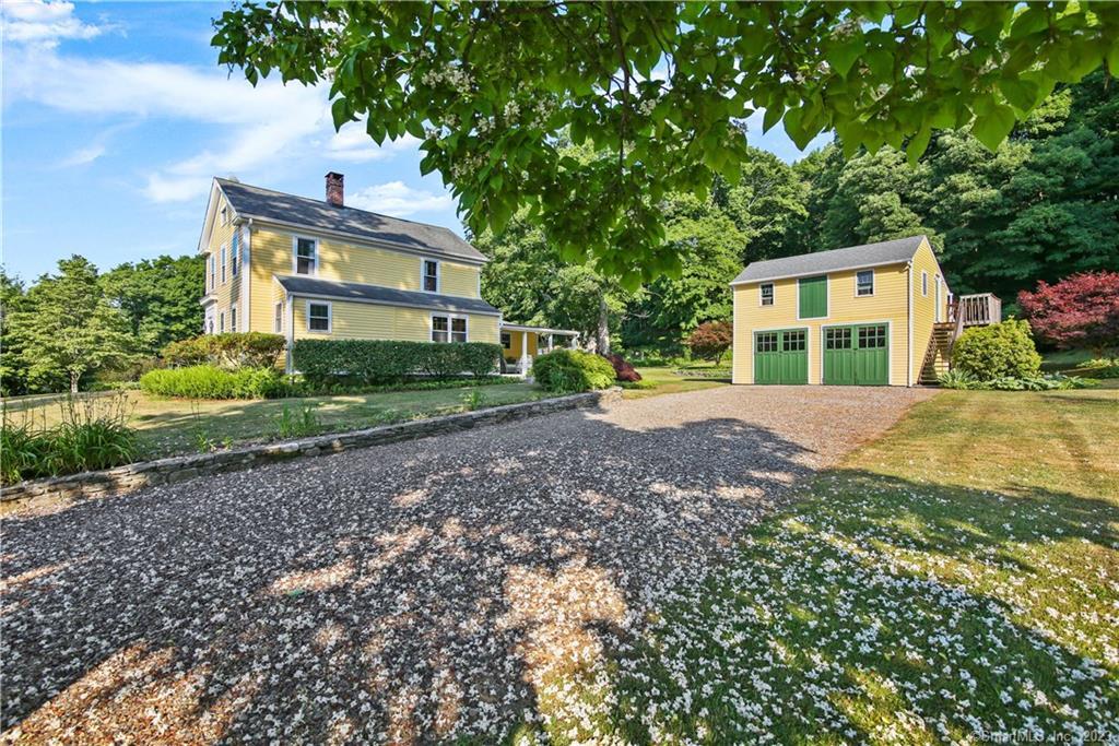 Welcome to 146 Freeman Road in the historic "Riverside" section of Oxford, CT. A fragrant Katalpa tree recently bloomed carpets the driveway entrance...