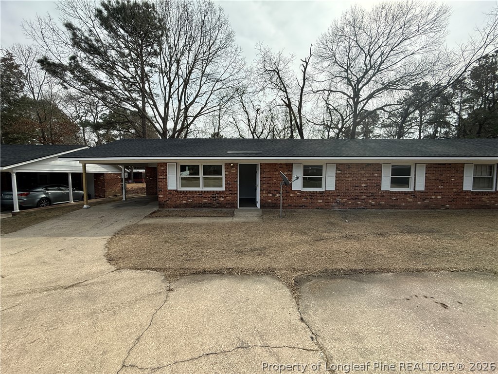 4736 Rosehill Road Fayetteville, NC 28311 - Photo 1 of 15 front view of a house with a yard