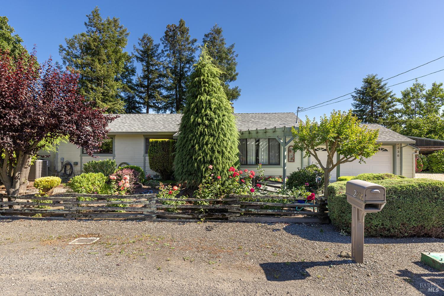 2236 West Hearn Avenue Santa Rosa, CA 95407 - Photo 9 of 56 a front view of a house with a yard