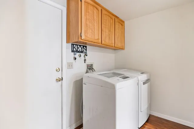 a utility room with dryer and washer