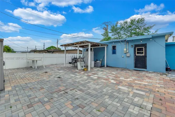 a view of a backyard of a house